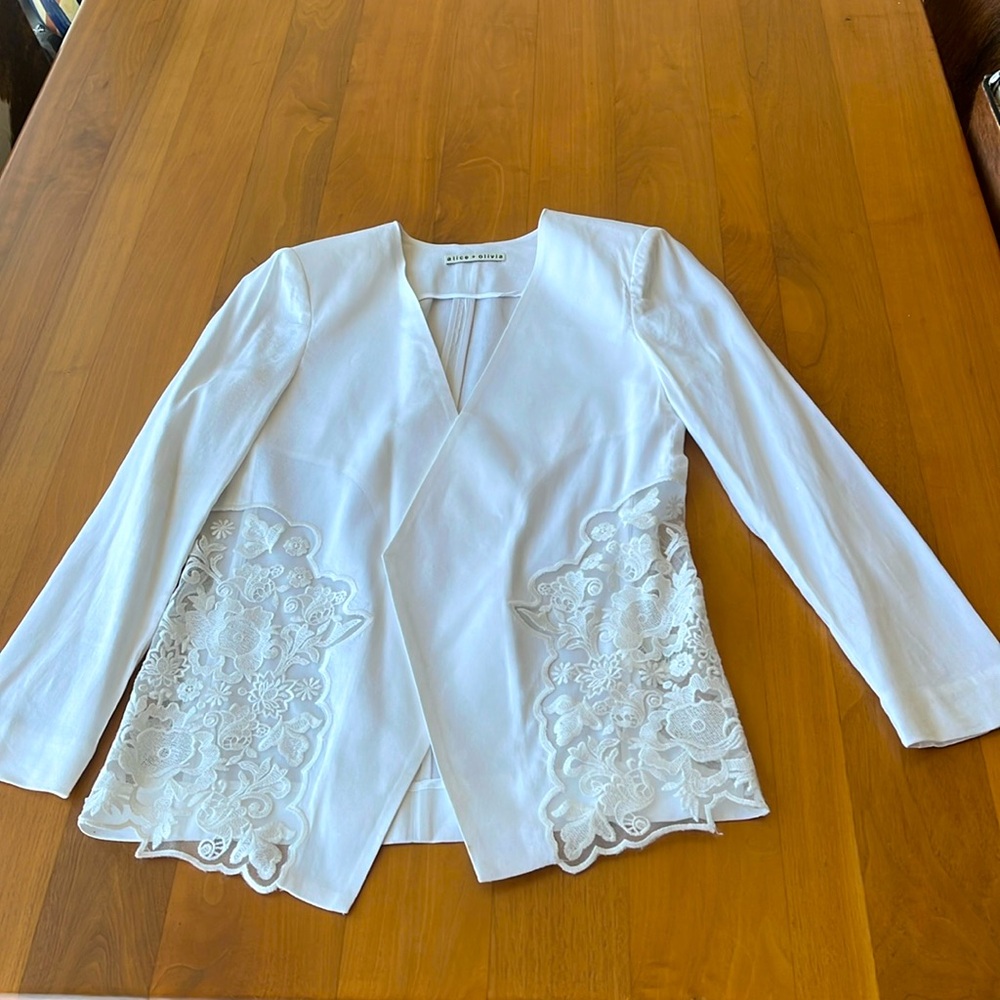 Alice and Olivia White linen blazer with lace accents. Size extra small.